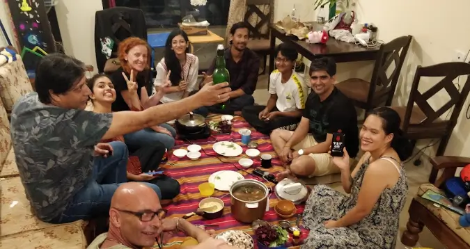 The image shows a digital nomad coliving community in Goa India