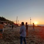 The image shows NomadGao Digital NomadGao Community on a beach in India