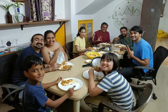 the image shows a community potluck for digital nomads in goa india at nomadgao assagao