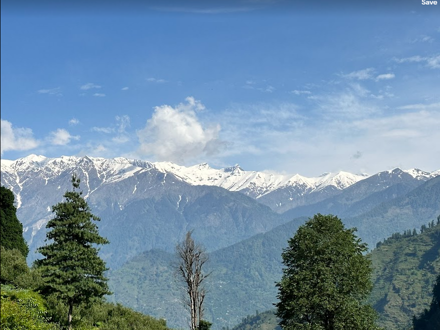 The image shows the snow-capped peaks of Pir Pranjal range in Kullu, Himachal