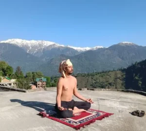 the image shows a digital nomad peacefully meditation to avoid remote work burnout